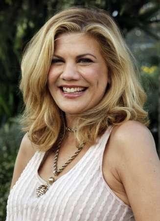 Actress Kristen Johnston poses during a photocall to promote the television series quotThe Exesquot