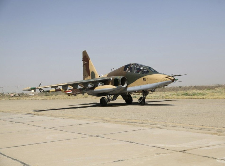 A Russian Sukhoi Su-25 fighter plane lands as it arrives at Iraq's al-Muthanna military airbase at Baghdad airport, in Baghdad, July 1, 2014. Iraq's defence ministry said on Tuesday that the second batch of Russian Sukhoi (Su-25) fighter jets th