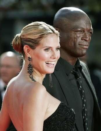 Nominee Heidi Klum L from quotProject Runwayquot and musician Seal arrive at the 61st annual Primetime Emmy Awards
