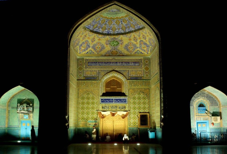 Afghans perform morning prayers during the holy month of Ramadan at the Blue Mosque in Mazar-i-Shariff