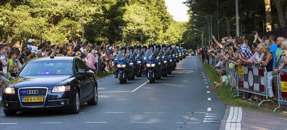 A motorcade accompanies a row of hearses carrying the bodies of victims killed in Malaysia Airlines Flight MH17 plane disaster arrives at the Korporaal van Oudheusden barracks in Hilversum July 23, 2014