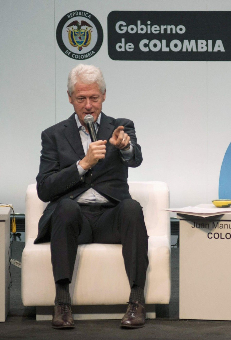 Former U.S. President Bill Clinton gestures as he speaks to the audience during &quot;The Third Way&quot; summit in Cartagena, July 1, 2014.