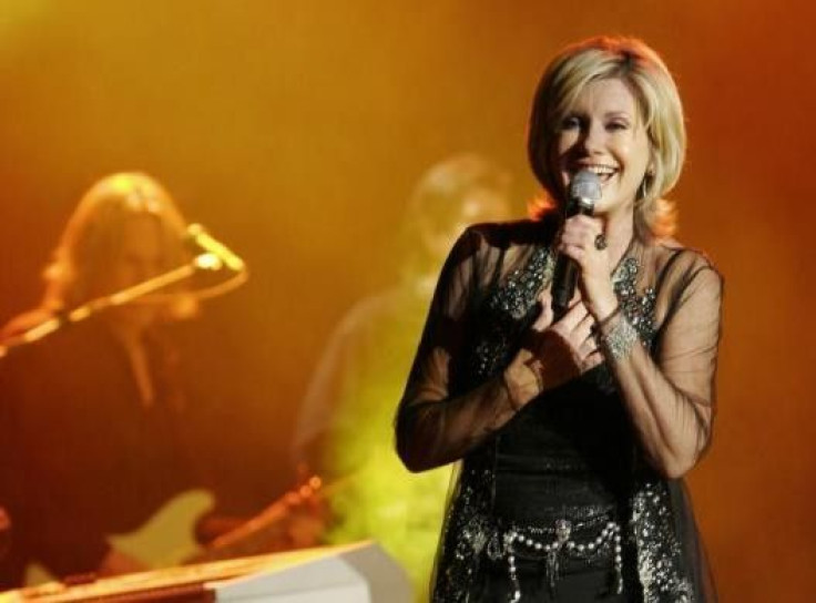 OLIVIA NEWTON-JOHN: Australian singer Olivia Newton-John, 64, was diagnosed in 1992 and underwent a partial mastectomy and chemotherapy. Her 2005 album, &quot;Stronger than Before&quot; promoted breast cancer awareness. She also introduced the &quot;Olivi