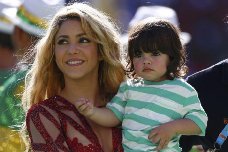 Singer Shakira Holds Her Son Milan Pique.
