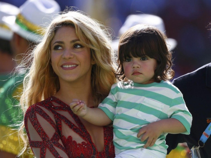 Singer Shakira Holds Her Son Milan Pique.