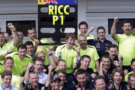 Winner Red Bull Formula One driver Daniel Ricciardo of Australia (C) celebrates with his team after the Hungarian F1 Grand Prix at the Hungaroring circuit, near Budapest July 27, 2014.