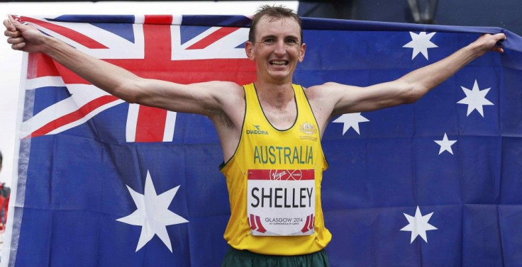 Michael Shelley of Australia celebrates after crossing the finish line to win the men&#039;s marathon gold medal at the 2014 Commonwealth Games in Glasgow, Scotland, July 27, 2014.