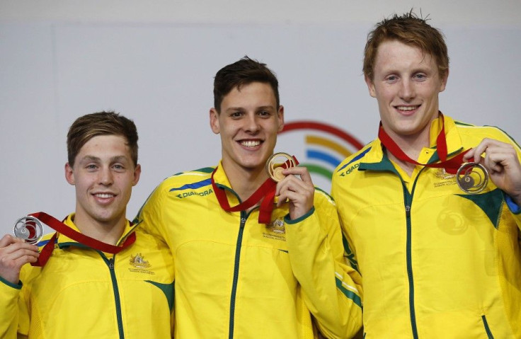 Australia's gold medallist Mitch Larkin (C), silver medallist Josh Beaver (L) and bronze medallist Matson Lawson pose with their medals in the men's 200m Backstroke at the 2014 Commonwealth Games in Glasgow, Scotland, July 28, 2014. REUTERS/Jim 