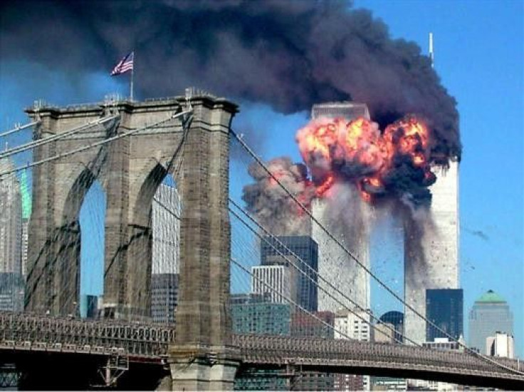 The second tower of the World Trade Center explodes into flames after being hit by a airplane, New York September 11, 2001 with the Brooklyn bridge in the foreground.