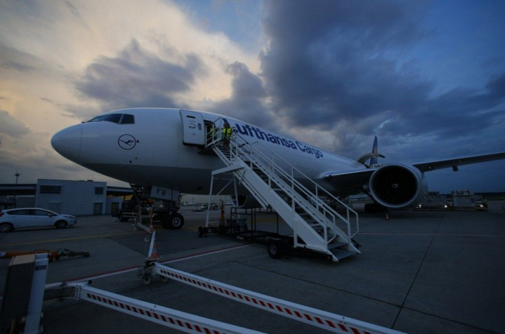 A Boeing 777-F aircraft of German Lufthansa Cargo air carrier stands on the tarmac during loading at Fraport airport in Frankfurt July 28, 2014. Today Lufthansa transports 66 horses to Tehran airport.  REUTERS/Ralph Orlowski (GERMANY - Tags: ANIMALS TRANS