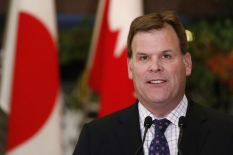 Canada's Foreign Minister John Baird speaking to the media in Tokyo 