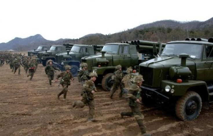 North Korean soldiers run as they attend military training in an undisclosed location in this picture released by the North&#039;s official KCNA news agency, March 11, 2013.