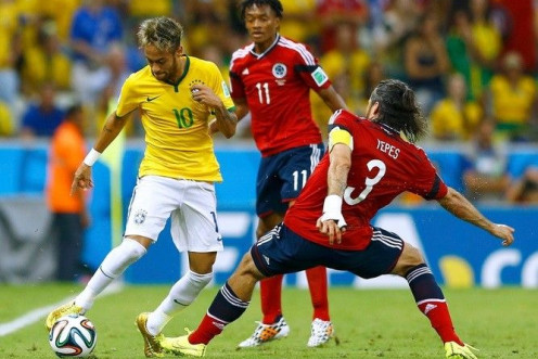 (L-R) Brazil&#039;s Neymar fights for the ball with Colombia&#039;s Juan Cuadrado and Mario Yepes during their 2014 World Cup quarter-finals at the Castelao arena in Fortaleza July 4, 2014.