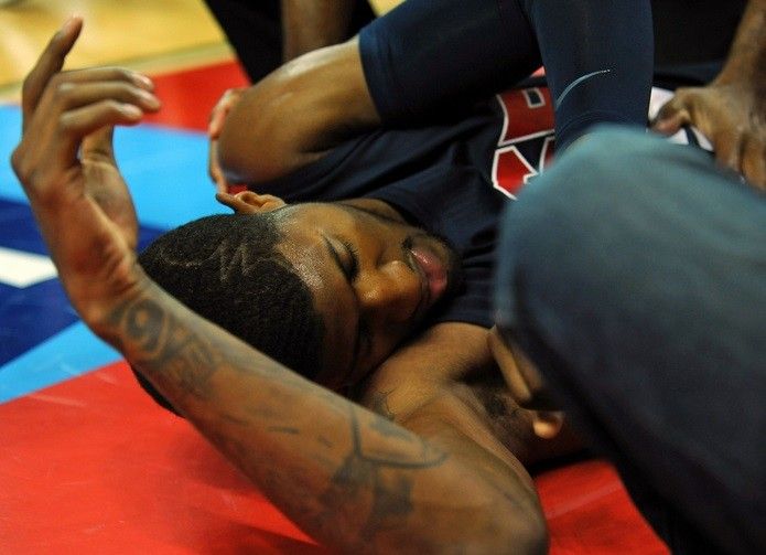 USA Team Blue guard Paul George lays on the floor after injuring his leg during the USA Basketball Showcase at Thomas  Mack Center.