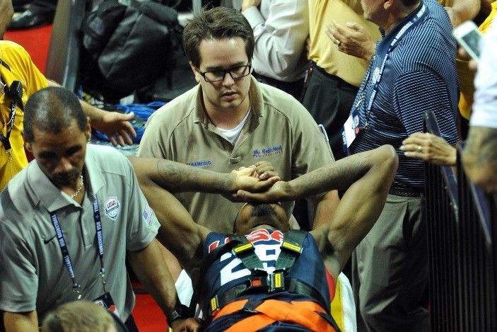 USA Team Blue guard Paul George 29 is carted off on a gurney after injuring his leg during the USA Basketball Showcase at Thomas Mack Center.