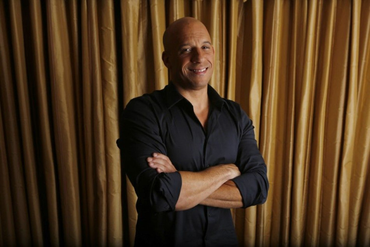 Actor Vin Diesel poses for a portrait while promoting his upcoming movie &quot;Riddick&quot; in Los Angeles, California August 27, 2013
