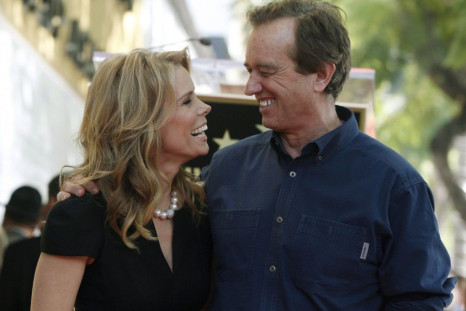 REFILE - CORRECTS DATE Actress Cheryl Hines (L) smiles at her boyfriend