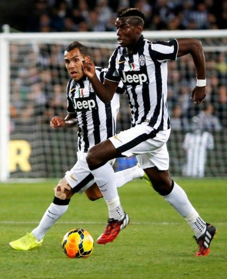 uventus&#039; Paul Pogba (R) and Carlos Tevez are pictured in the first half of their soccer match against Australia&#039;s A-League All Stars in Sydney, August 10, 2014.