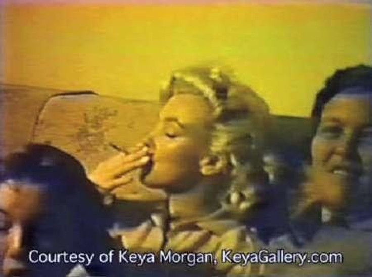A frame grab from an undated home movie of Marilyn Monroe apparently smoking marijuana,