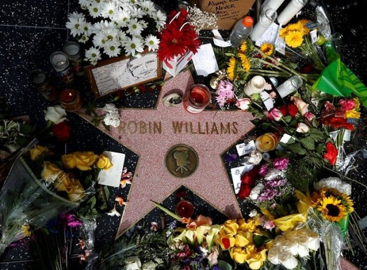 Flowers Are Seen On The Late Robin Williams' Star On The Hollywood Walk Of Fame In Los Angeles