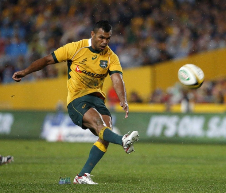 Kurtley Beale of Australia's Wallabies kicks a penalty goal during their Rugby Championship match against the New Zealand's All Blacks in Sydney August 16, 2014.