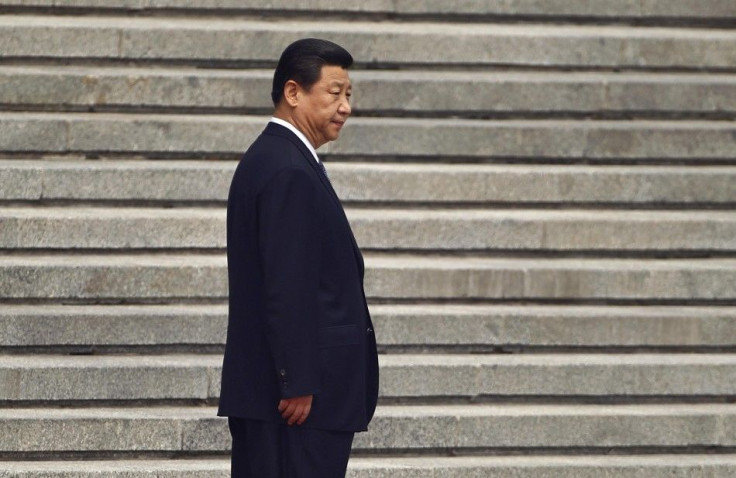 File photo of China's President Xi Jinping waiting before a welcoming ceremony outside the Great Hall of the People in Beijing
