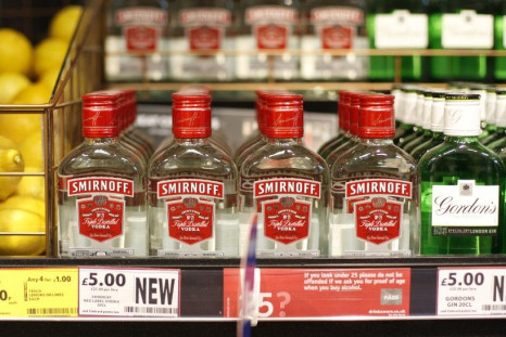 Lemons, Smirnoff Vodka And Gordon's Gin Are Displayed At A Tesco Extra Supermarket.