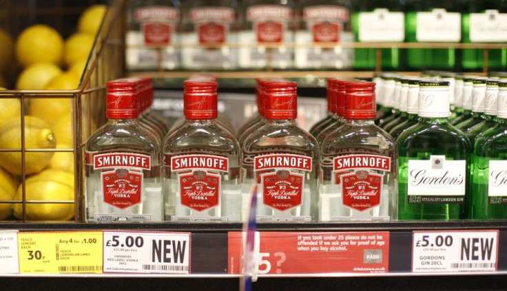 Lemons, Smirnoff Vodka And Gordon's Gin Are Displayed At A Tesco Extra Supermarket.