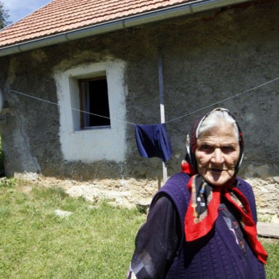An elderly woman is pictured in the birth village of Gavrilo Princip