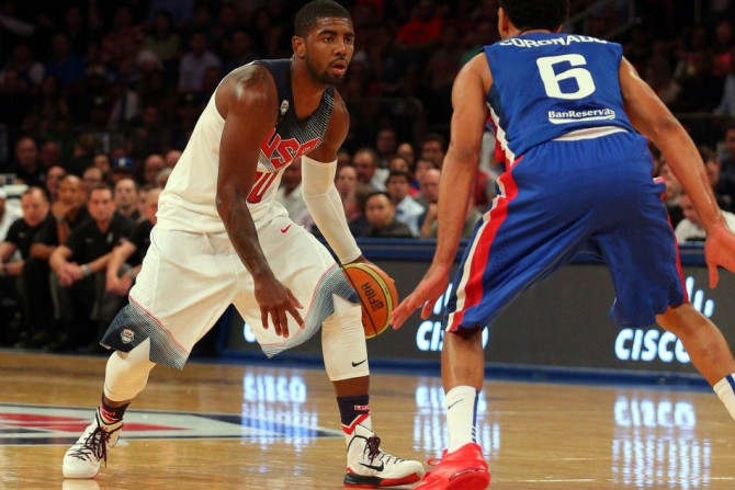 Aug 20, 2014; New York, NY, USA; United States guard Kyrie Irving (10) controls the ball against Dominican Republic guard Juan Coronado (6) during the second quarter of a game at Madison Square Garden