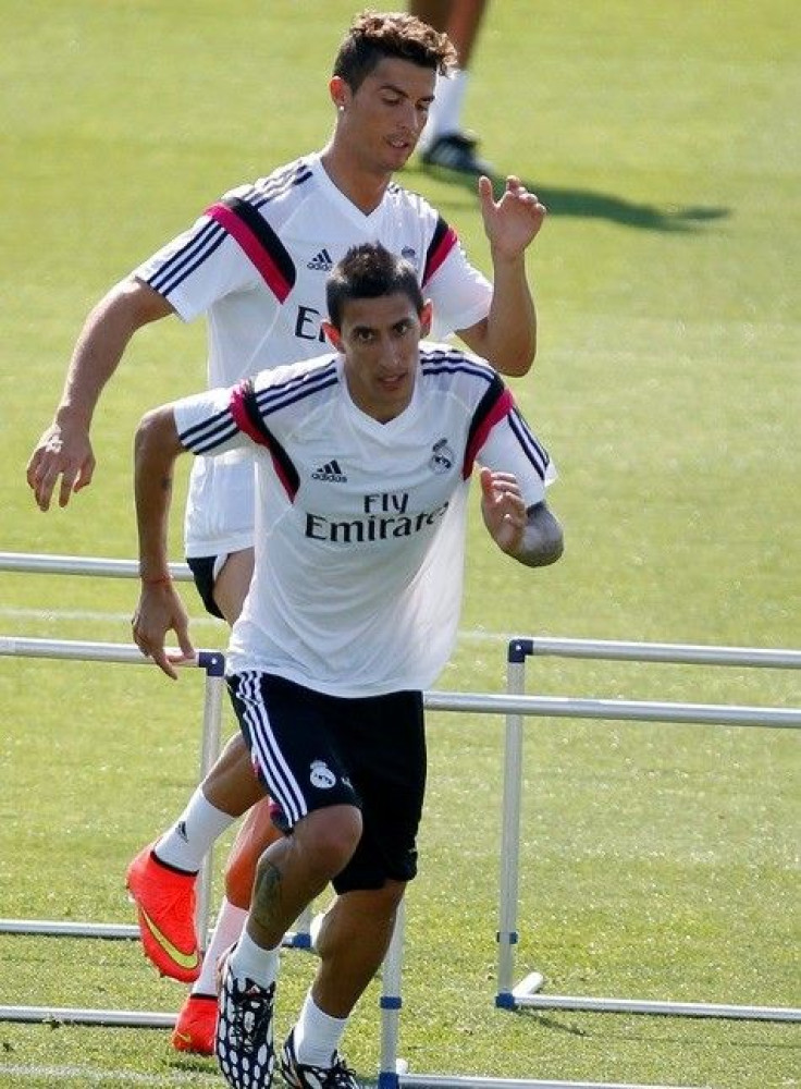 Real Madrid&#039;s Angel Di Maria and Cristiano Ronaldo(top) attend a training session at Valdebebas training grounds, outside Madrid August 5, 2014.