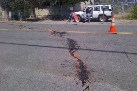 A crack runs across the road following an earthquake in Saintsbury, California