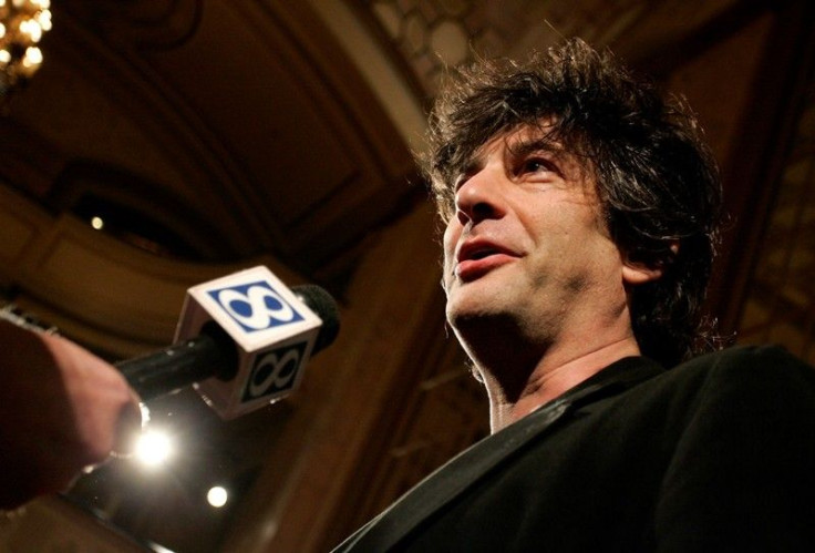 British Author Neil Gaiman Talks To A Reporter As He Arrives At The Premiere Of The Animated Movie &#039;Coraline.&#039;