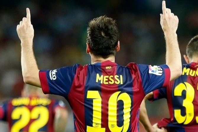 Barcelona&#039;s Lionel Messi celebrates his second goal against Elche during their Spanish first division soccer match at Camp Nou stadium in Barcelona August 24, 2014.