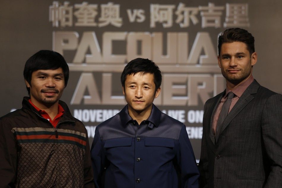  Manny Pacquiao from the Philippines, Chinas Zou Shiming, two-time Olympic gold medal winner and three-time World Amateur Champion, and Chris Algieri of the U.S.