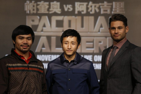  Manny Pacquiao from the Philippines, China's Zou Shiming, two-time Olympic gold medal winner and three-time World Amateur Champion, and Chris Algieri of the U.S.