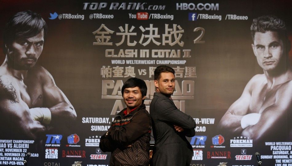 Manny Pacquiao L from the Philippines and Chris Algieri of the U.S. pose during a news conference at Venetian Macao