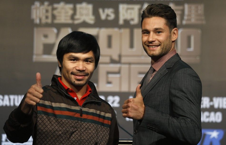 Manny Pacquiao L from the Philippines and Chris Algieri of the U.S. give thumbs up during a news conference at Venetian Macao