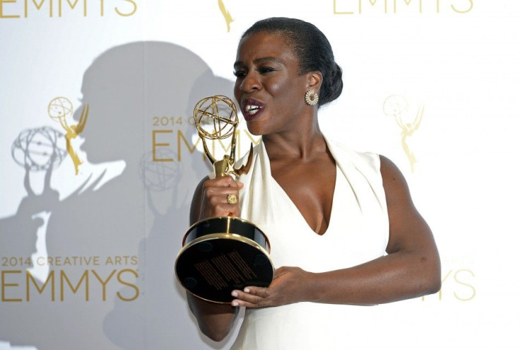 IN PHOTO: Actress Uzo Aduba poses backstage with the Emmy for Outstanding Guest Actress in a Comedy Series &quot;Orange Is The New Black&quot;
