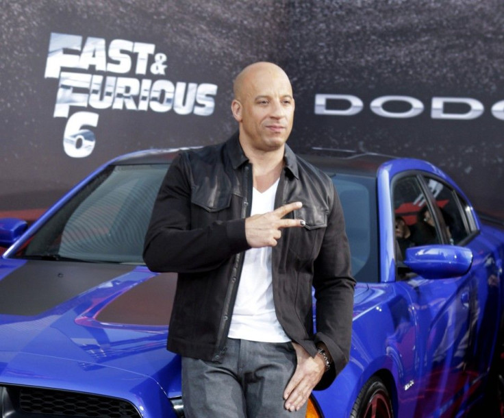 Cast member and producer Vin Diesel poses at the premiere of the new film, &quot;Fast & Furious 6&quot;