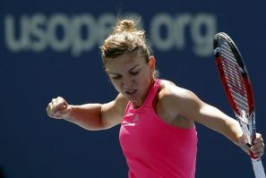 Simona Halep of Romania celebrates a point over Danielle Rose Collins of the U.S. during their match at the 2014 U.S. Open tennis tournament in New York, August 25, 2014.