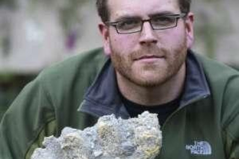 American television channel host Josh Gates displays what is believed to be &#039;Yeti&#039; footprints to the media in Kathmandu