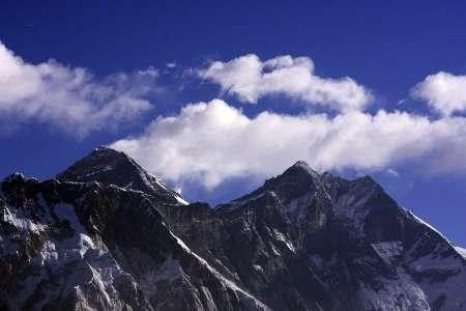 Clouds rise behind Mount Everest, the world's highest peak at 8,848 metres
