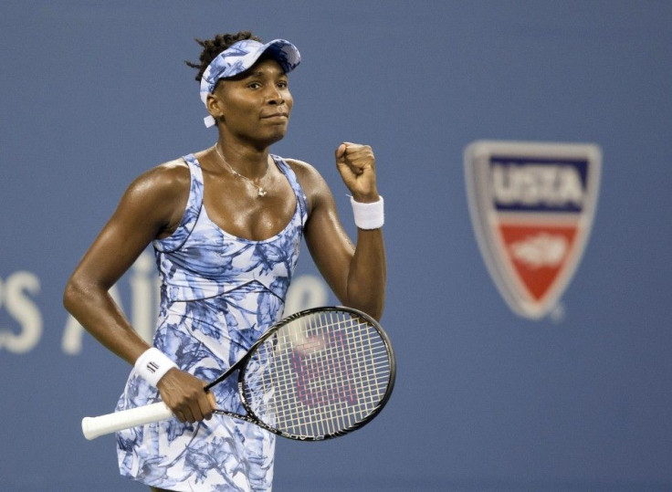 Aug 27, 2014; New York, NY, USA; Venus Williams (USA) celebrates recording match point in her match against Timea Bacsinszky (SUI) on day three of the 2014 U.S. Open tennis tournament at USTA Billie Jean King National Tennis Center.