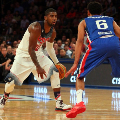 Aug 20, 2014; New York, NY, USA; United States guard Kyrie Irving (10) controls the ball against Dominican Republic guard Juan Coronado (6) during the second quarter of a game at Madison Square Garden.