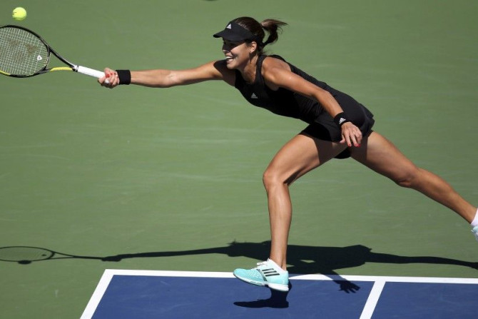 Ana Ivanovic of Serbia hits a return to Karolina Pliskova of the Czech Republic during their match at the 2014 U.S. Open tennis tournament in New York, August 28, 2014.