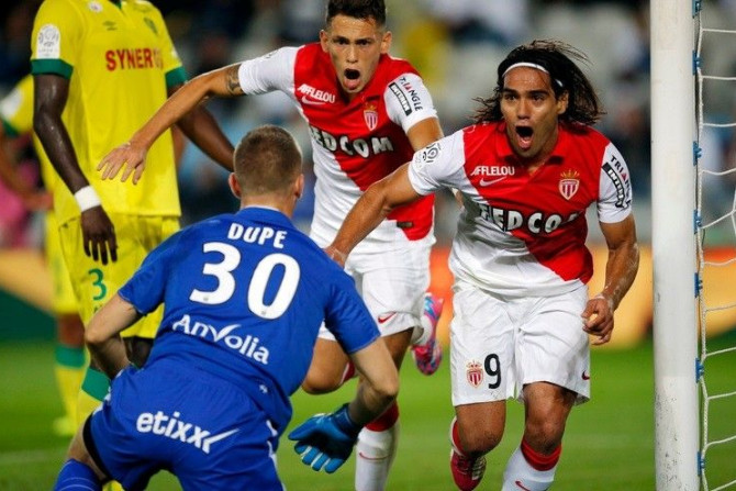 Monaco's Radamel Falcao (R) celebrates after scoring against Nantes during their French Ligue 1 soccer match at the Beaujoire in Nantes, August 24, 2014.