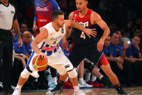 Aug 22, 2014; New York, NY, USA; Puerto Rico guard Jose Juan Barea (5) controls the ball in front of United States guard Stephen Curry (4) during the fourth quarter of a game at Madison Square Garden