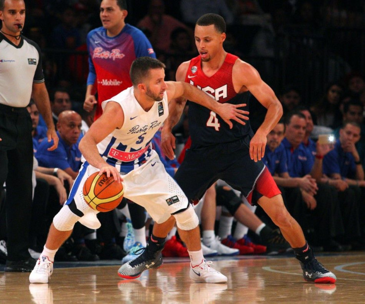 Aug 22, 2014; New York, NY, USA; Puerto Rico guard Jose Juan Barea (5) controls the ball in front of United States guard Stephen Curry (4) during the fourth quarter of a game at Madison Square Garden