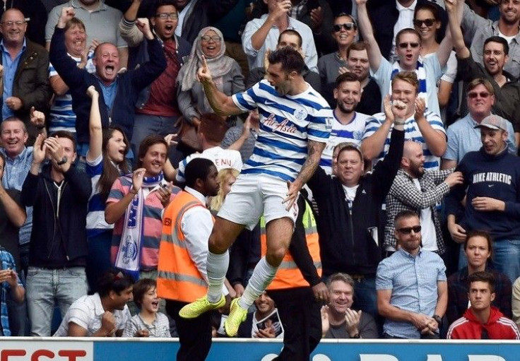 Queens Park Rangers&#039; Charlie Austin celebrates after scoring a goal against Sunderland during their English Premier League soccer match at Loftus Road in London August 30, 2014.